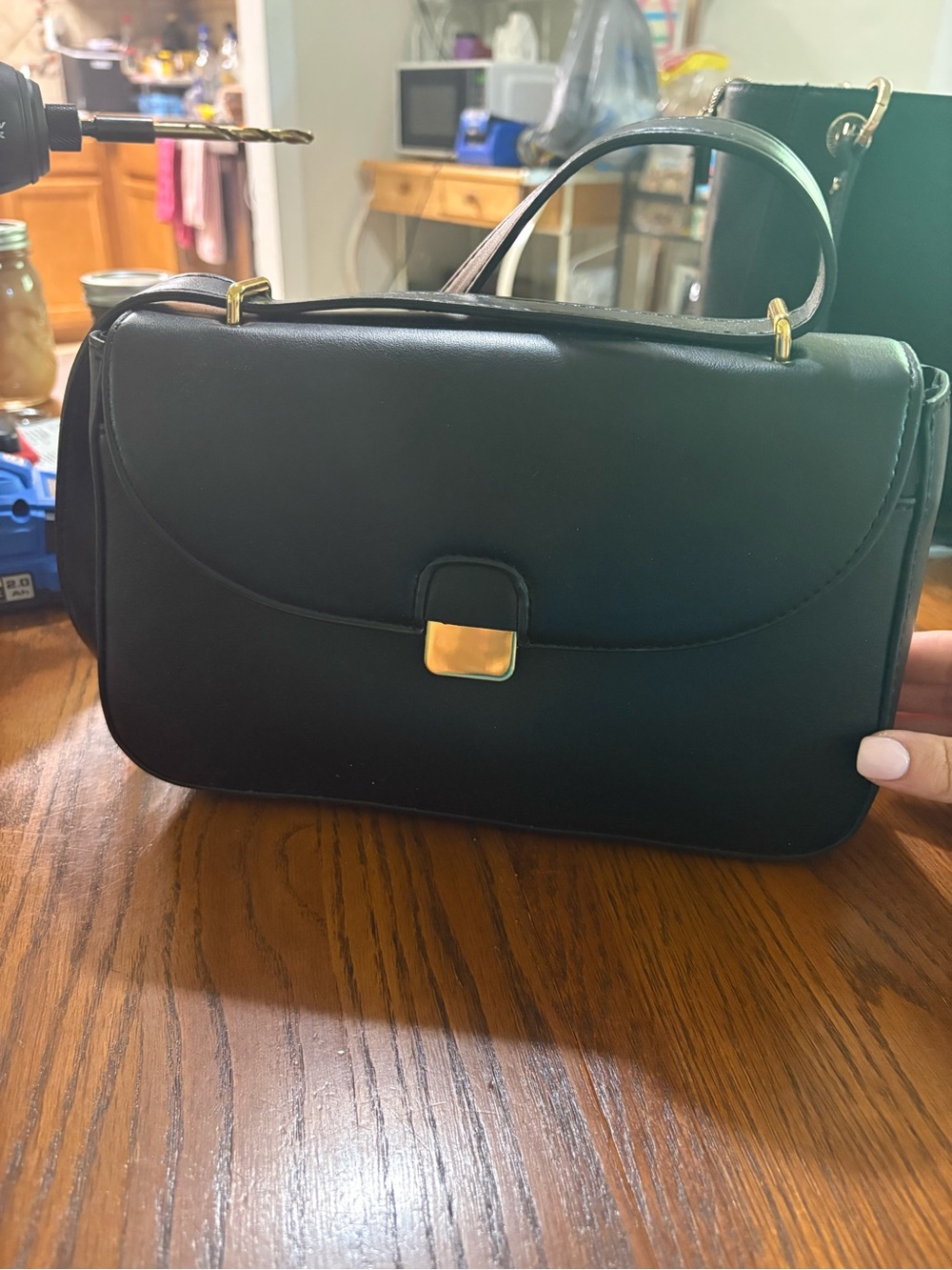 Classic Black Leather Top-Handle Bag with Gold Accent